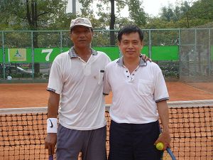 96年度網球會內賽-吳技師與邱技師比賽合影